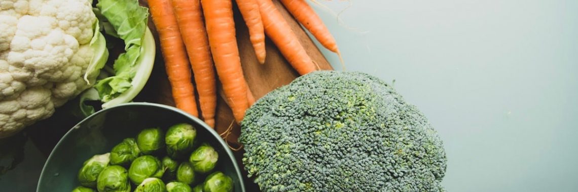 carrots and broccoli on stainless steel bowl